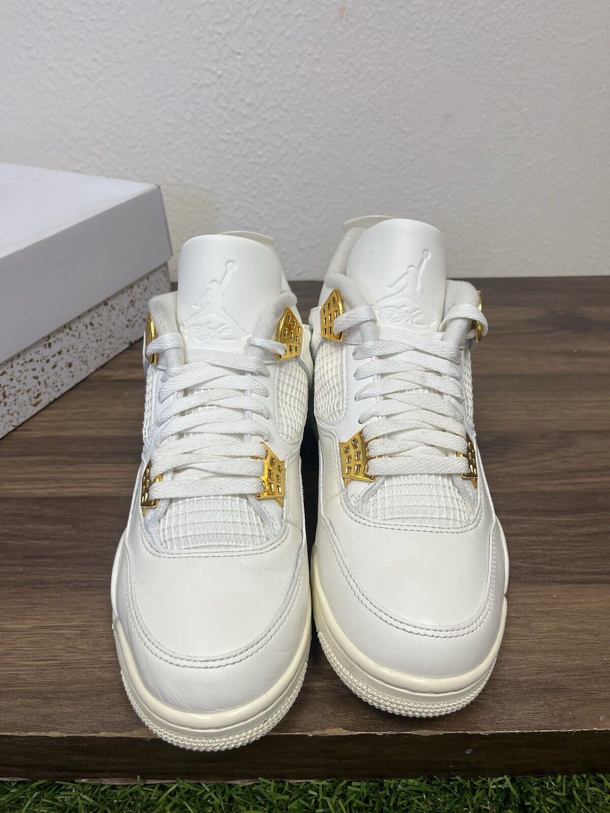 Size 8.5 men’s/ 10 women’s- Air Jordan 4 Retro Metallic Gold W